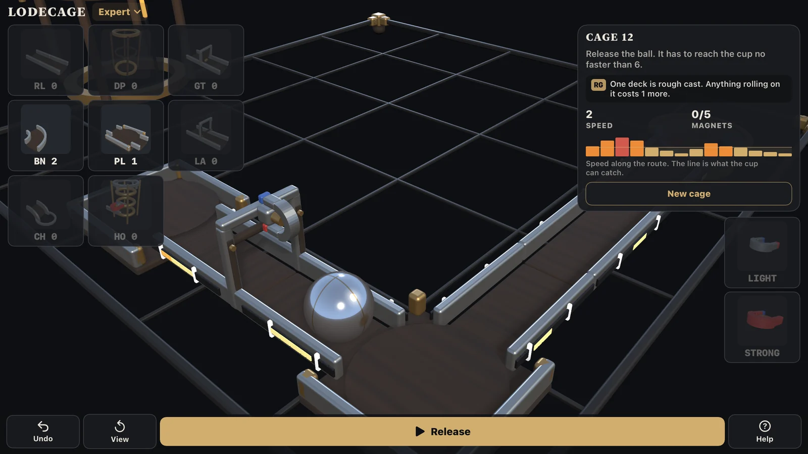 A LodeCage Expert cage with the card naming its fitting, a rough-cast deck, and the ball on the rail